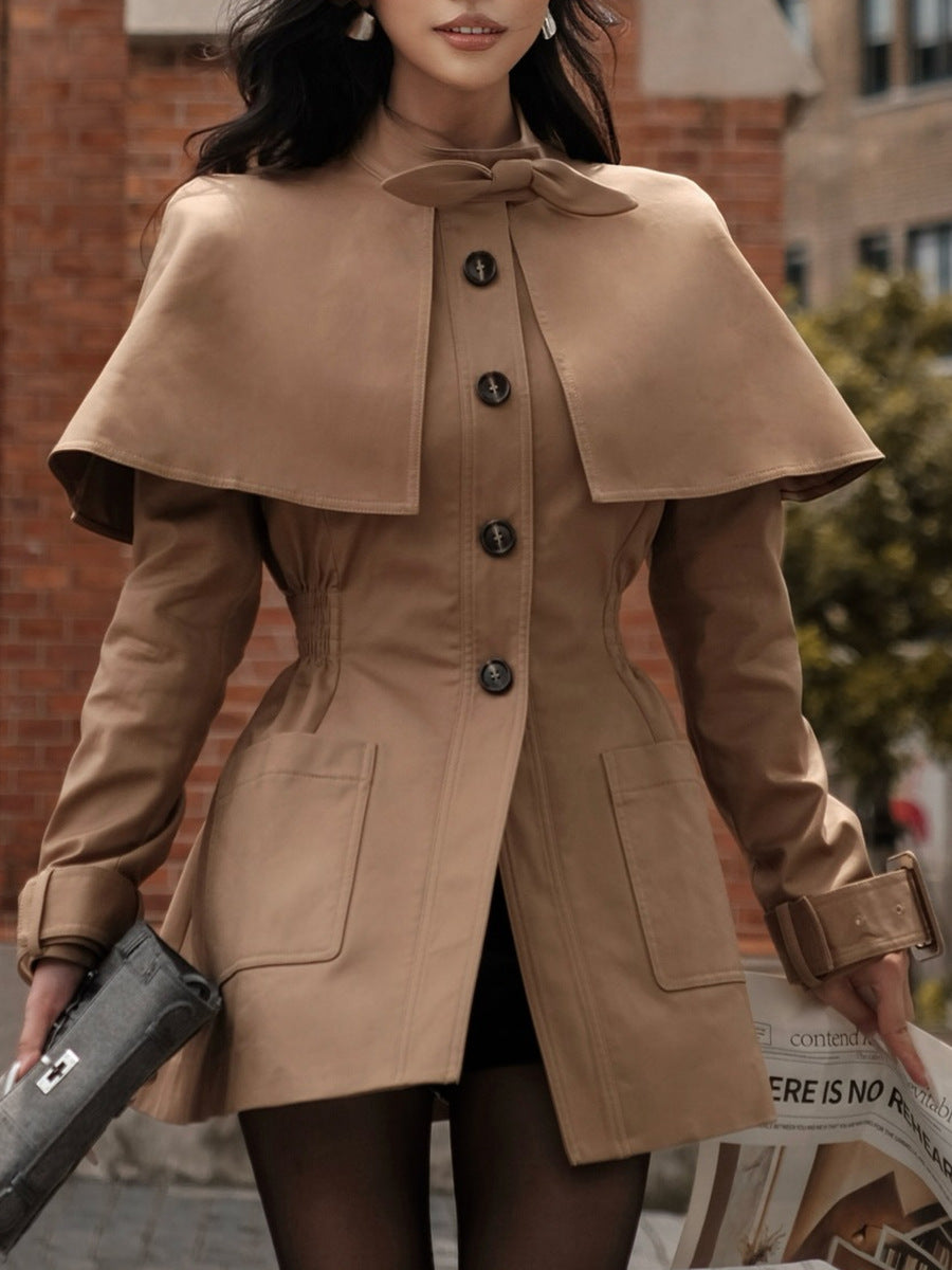 tailored coat with cape overlay and bow neckline – AMBER