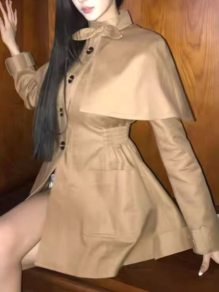 tailored coat with cape overlay and bow neckline – AMBER