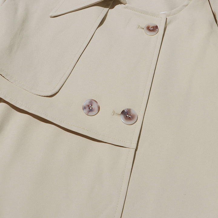 asymmetric belted trench coat with layered hem – IVORY