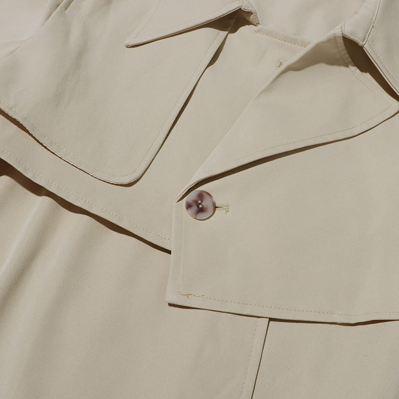 asymmetric belted trench coat with layered hem – IVORY