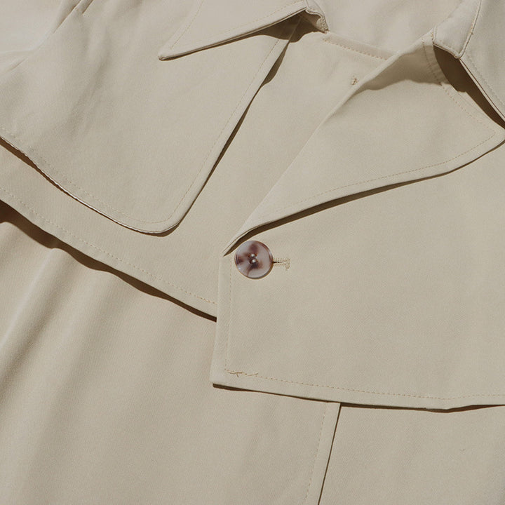 asymmetric belted trench coat with layered hem – IVORY