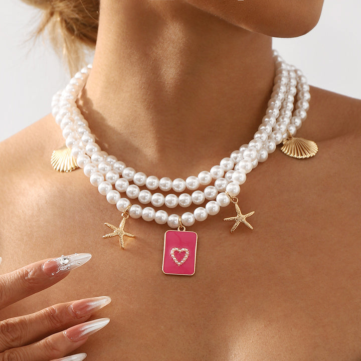 layered pearl necklace with sea charms & statement pendant - SIRENARI