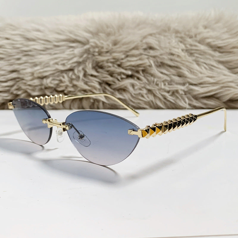 rimless cat-eye sunglasses with gold studded temples – ASTRIDI