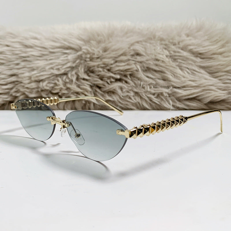rimless cat-eye sunglasses with gold studded temples – ASTRIDI