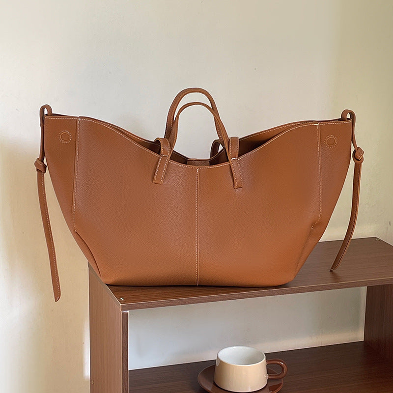 soft winged leather tote with drawstring side ties – ARIA