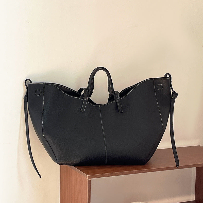 soft winged leather tote with drawstring side ties – ARIA