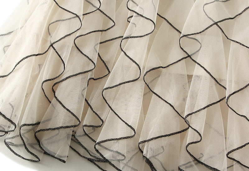 layered tulle skirt with contrast wave edging – SERENE