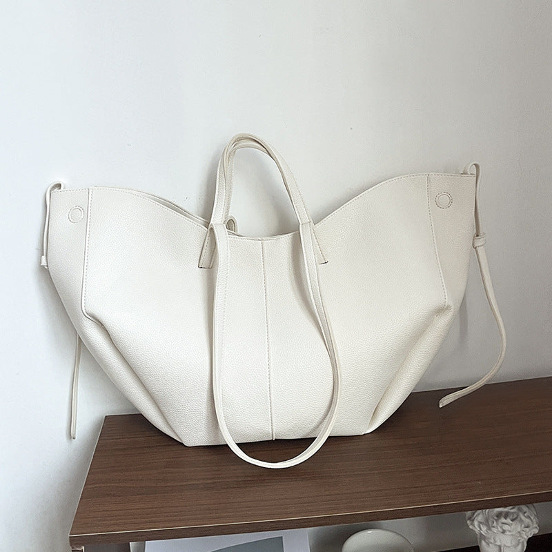 soft winged leather tote with drawstring side ties – ARIA