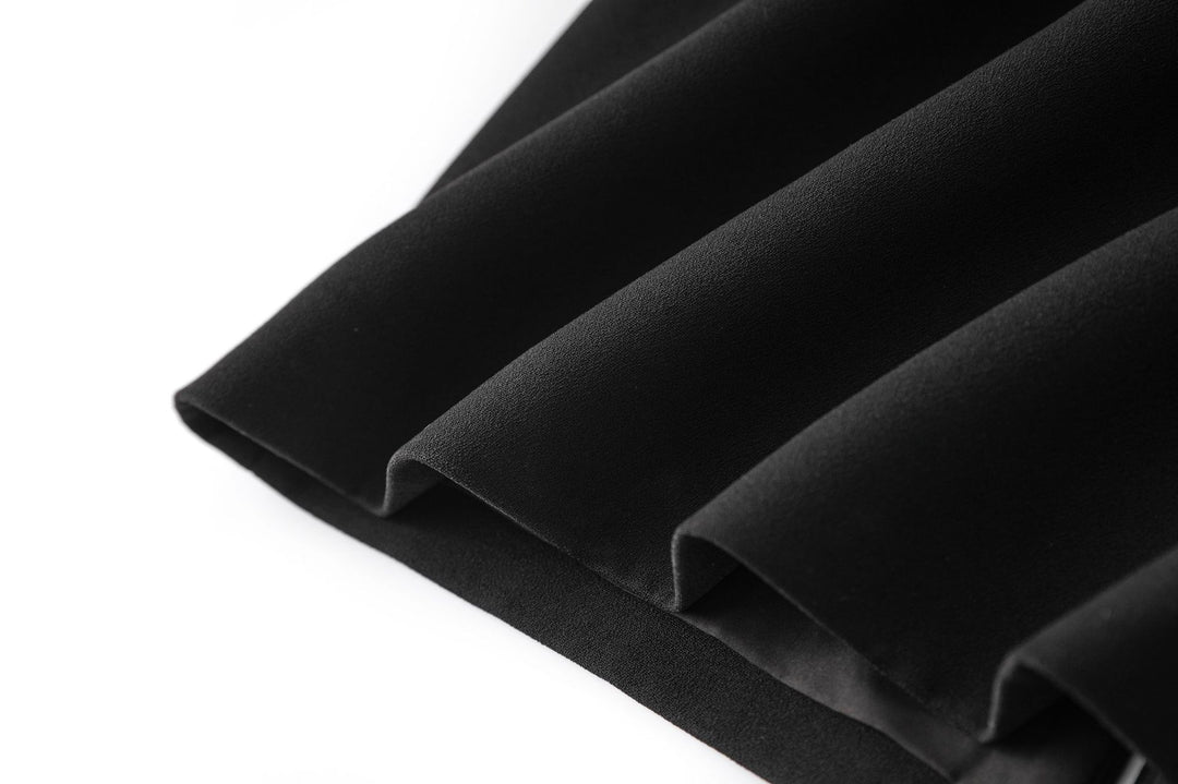 فستان مطرز غير متماثل بتفاصيل من الساتان الزمردي – نوير