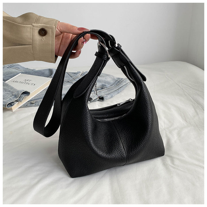 gewebte Rattan-Tragetasche mit doppelten Ledergriffen – LÉONIE 