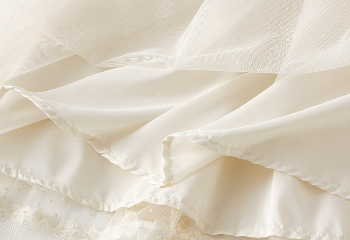 تنورة ميدي من التول المنقطة متعددة الطبقات مع حافة من الدانتيل – إليورا