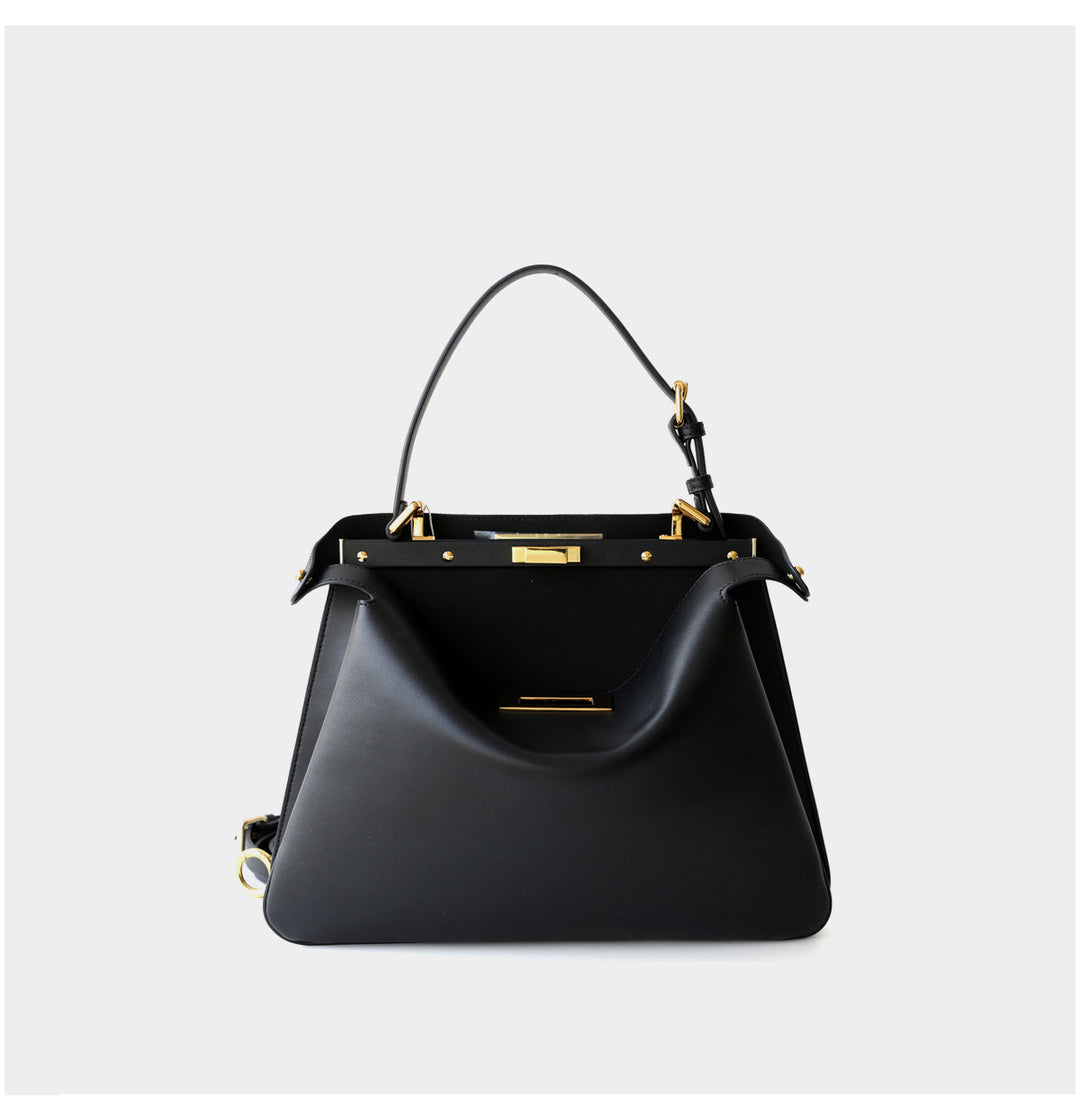 structured leather top-handle bag with gold hardware – ARIEL