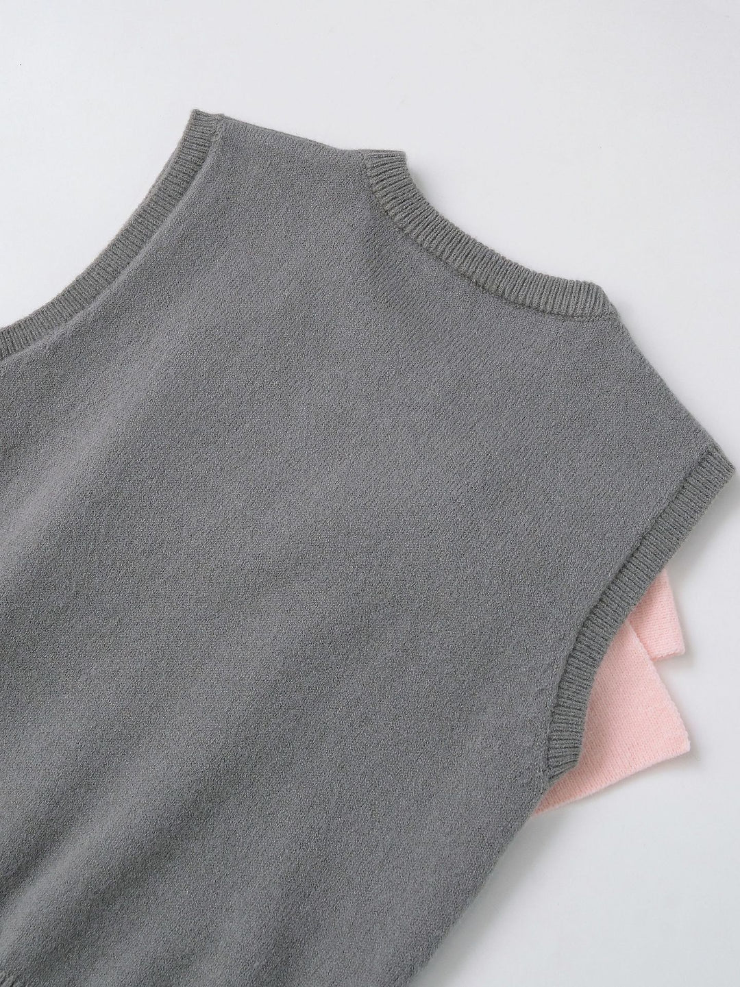 sleeveless knit vest with bow detail – LUMI