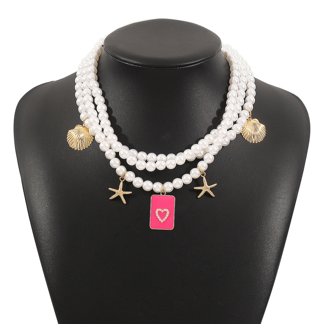 layered pearl necklace with sea charms & statement pendant - SIRENARI