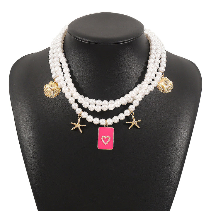 layered pearl necklace with sea charms & statement pendant - SIRENARI