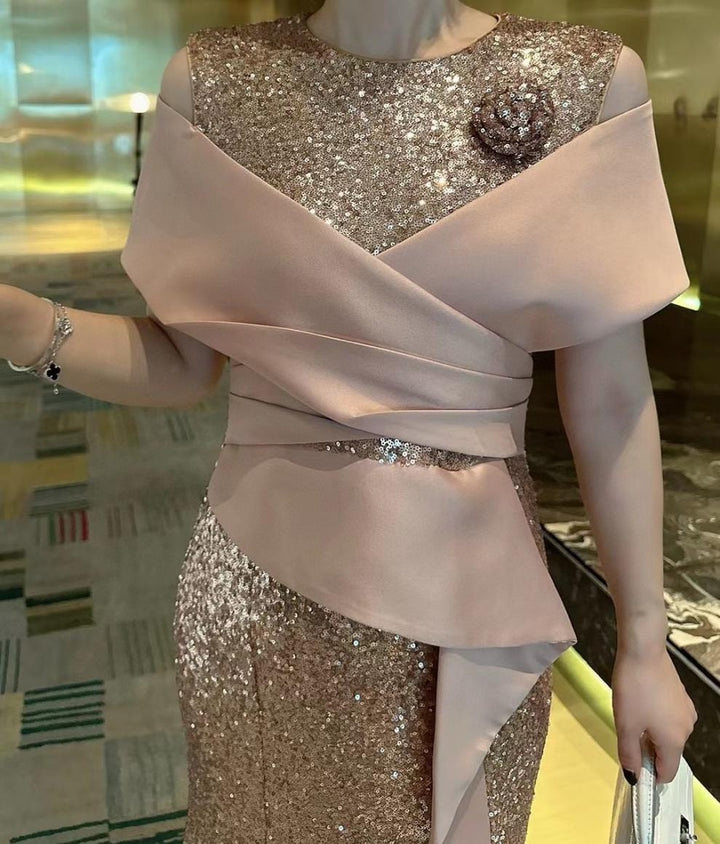 فستان حورية البحر من الترتر مع صدّار ملفوف من الساتان – فيوليتا