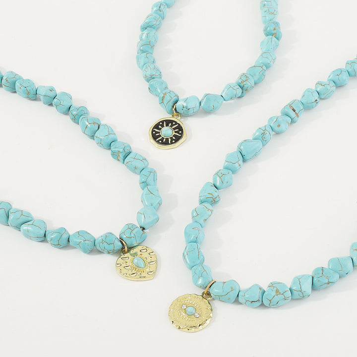 turquoise bead necklace set with symbolic pendants – AZURA