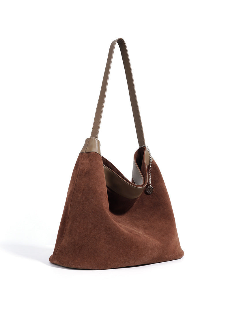 gewebte Rattan-Tragetasche mit doppelten Ledergriffen – LÉONIE 