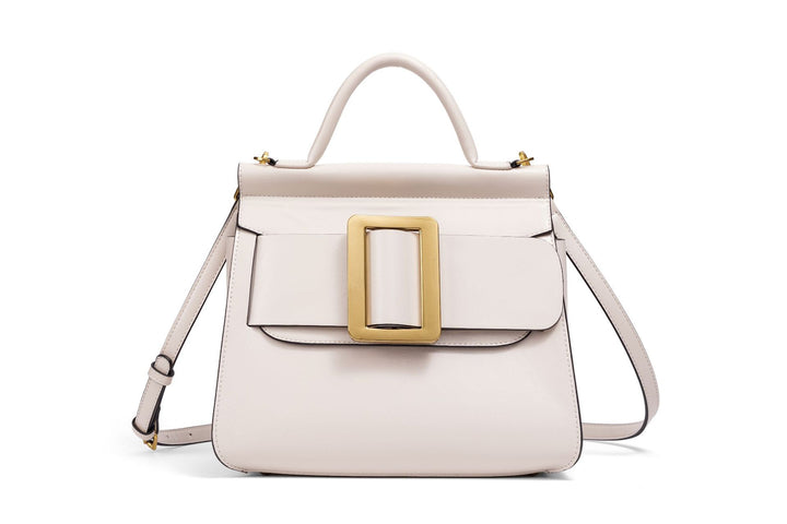 structured leather top-handle bag with oversized buckle – AURIKLA