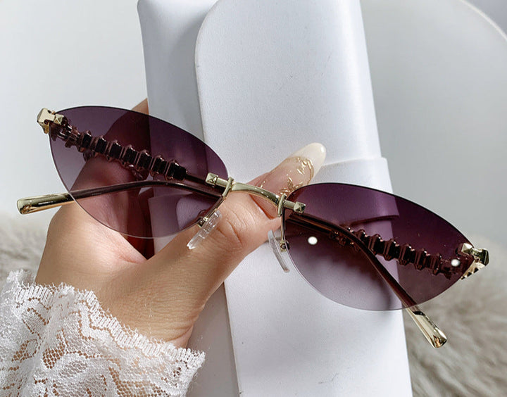 rimless cat-eye sunglasses with gold studded temples – ASTRIDI