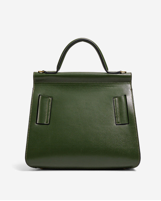 structured leather top-handle bag with oversized buckle – AURIKLA