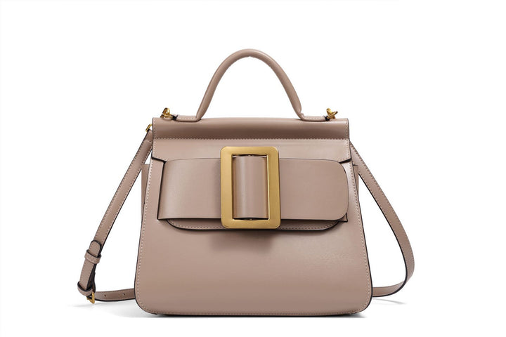 structured leather top-handle bag with oversized buckle – AURIKLA