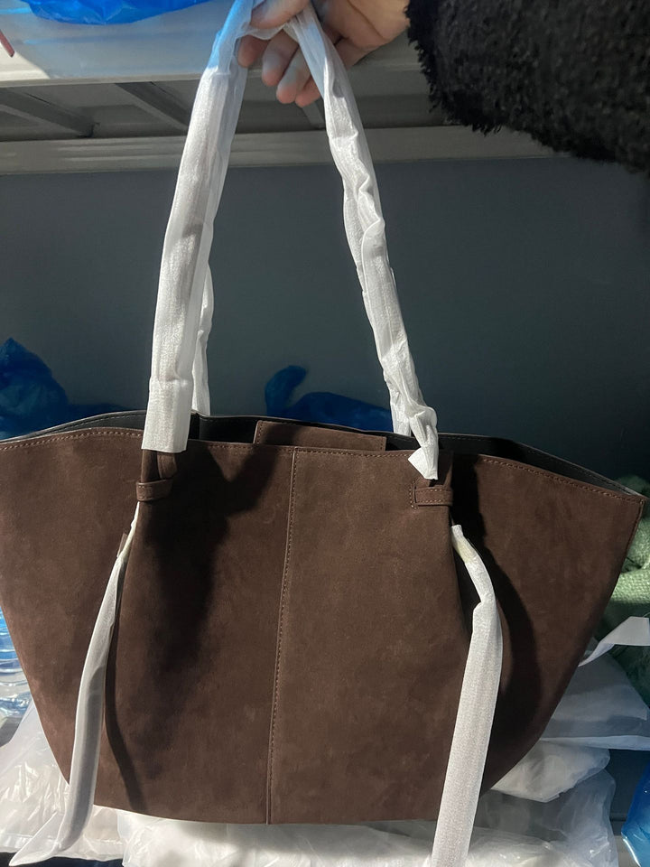 suede winged tote bag with adjustable drawstring straps – SERENA
