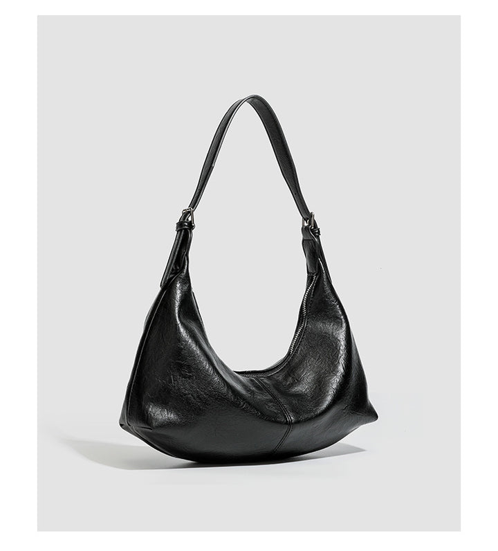 gewebte Rattan-Tragetasche mit doppelten Ledergriffen – LÉONIE 