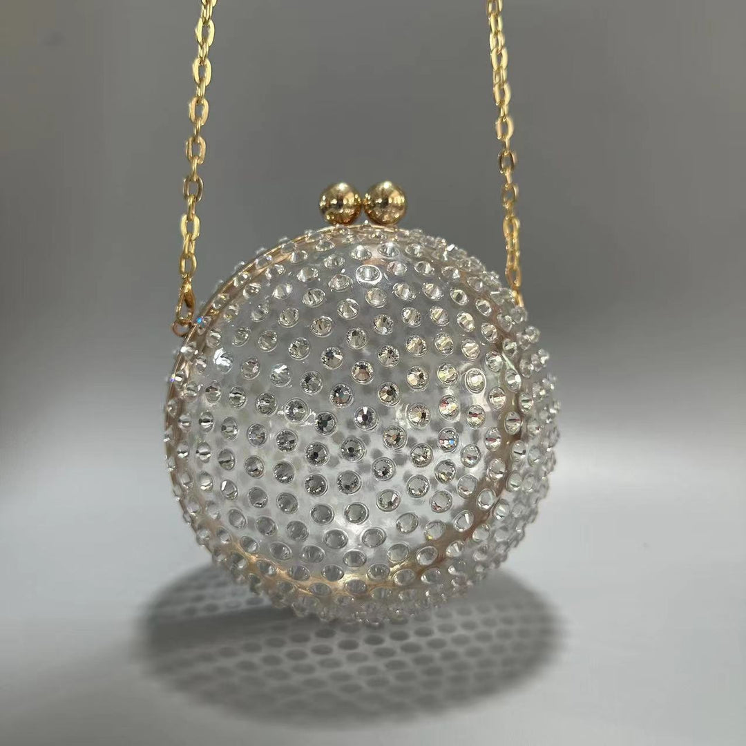round crystal-embellished clutch with gold frame – NORVILA