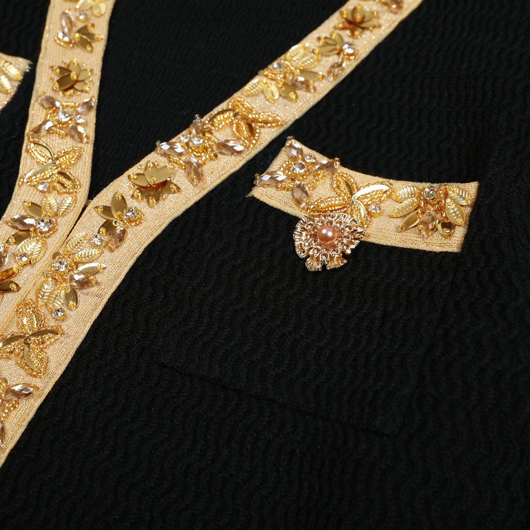 فستان قصير محبوك بأكمام طويلة وحواف ذهبية – فينيوني
