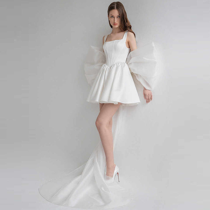 sleeveless mini dress with voluminous puff sleeves and long train - AUROKLA