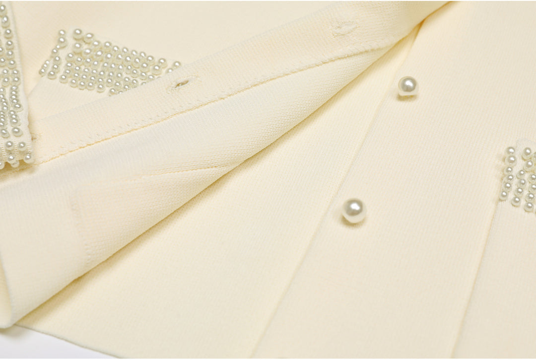 cropped tweed jacket with pearl-embellished pockets – DARAXI