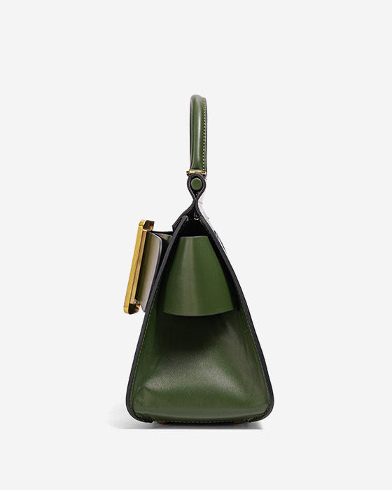 structured leather top-handle bag with oversized buckle – AURIKLA