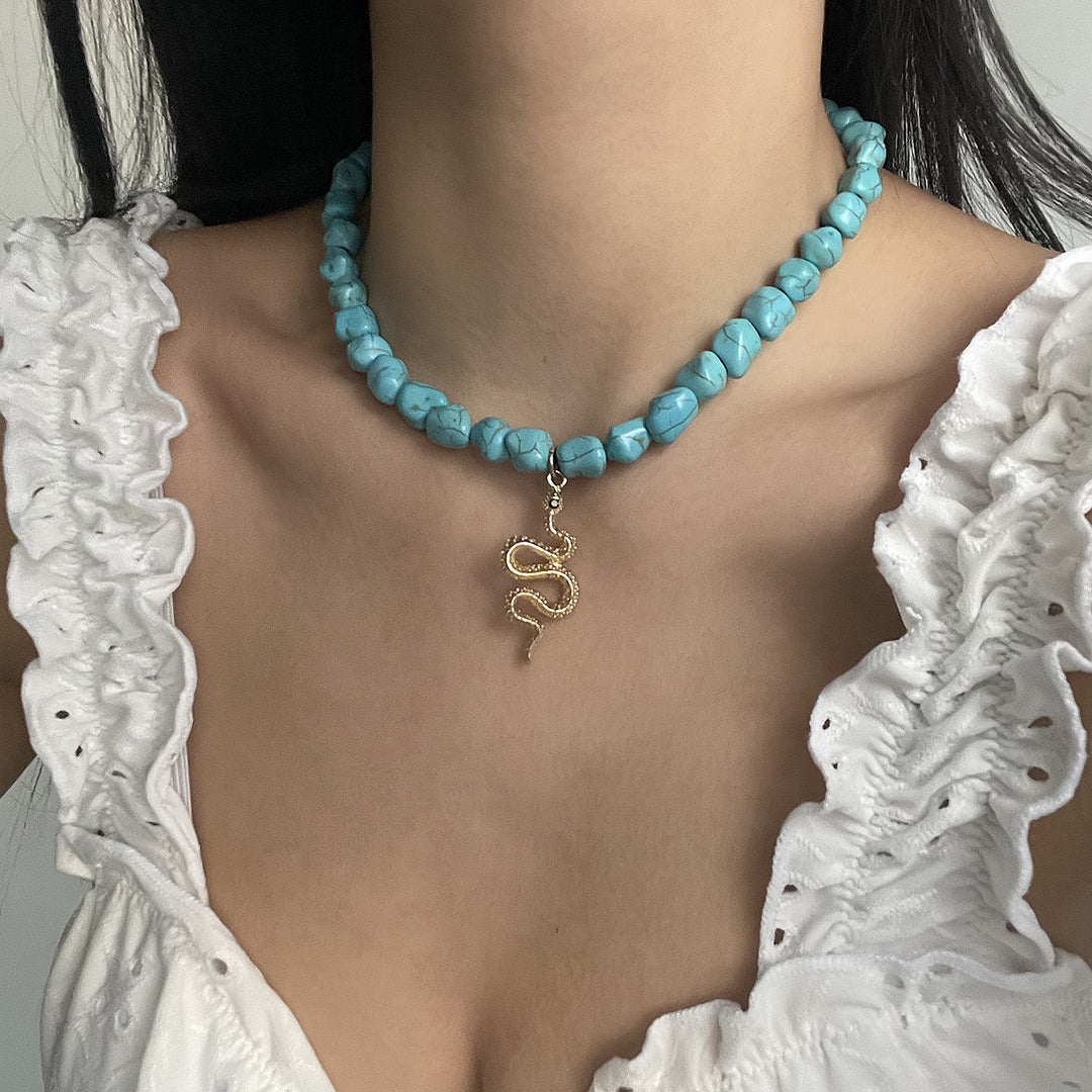 turquoise bead necklace set with symbolic pendants – AZURA