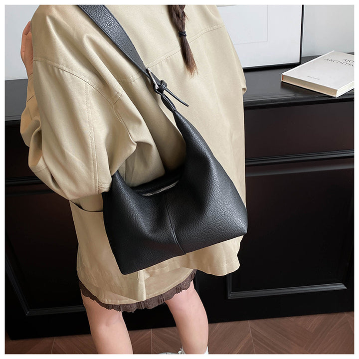 gewebte Rattan-Tragetasche mit doppelten Ledergriffen – LÉONIE 