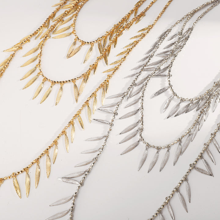 layered leaf pendant necklace with metallic finish – SERENAT