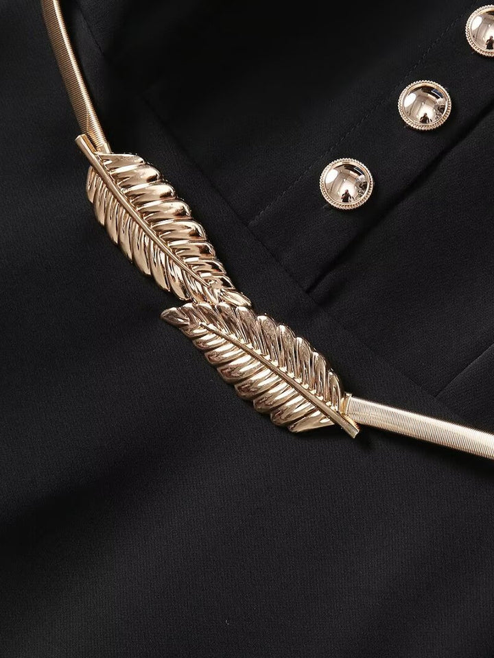 فستان ماكسي أسود بأكمام طويلة وتطريز بأوراق ذهبية – نوير بالم