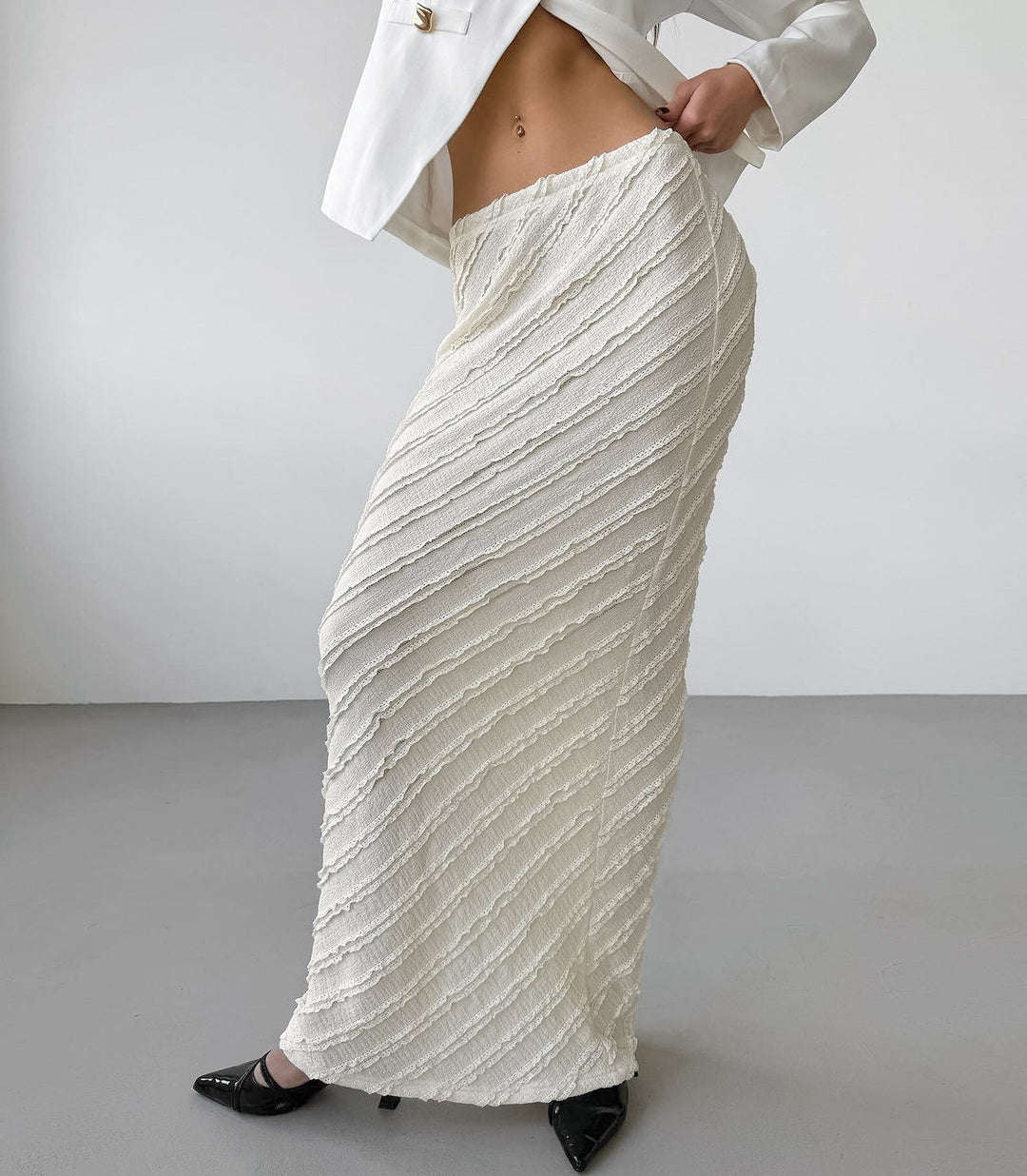 تنورة عمودية عالية الخصر بخطوط قطرية منقوشة – سيرينيلكي