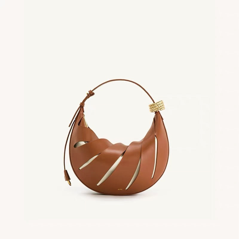 sculptural metallic crescent bag with wrapped handle – SELENE