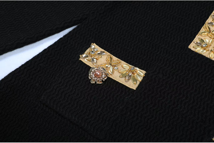 فستان قصير محبوك بأكمام طويلة وحواف ذهبية – فينيوني
