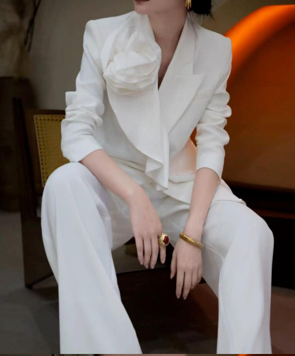 structured suit with oversized floral appliqué – PETAL