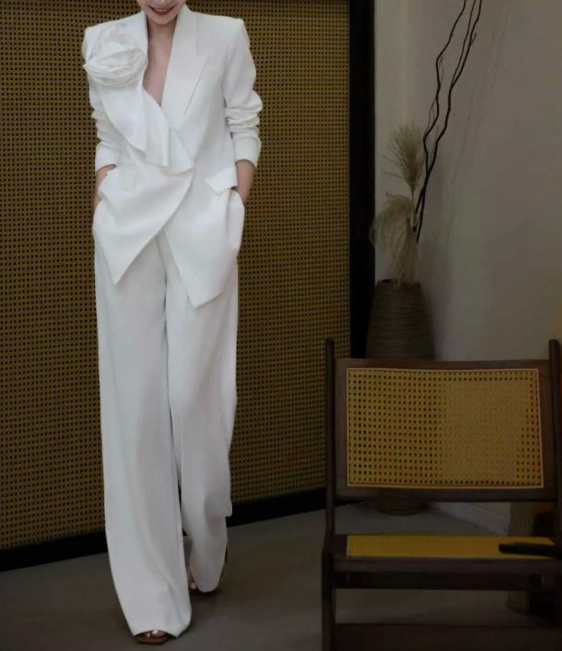 structured suit with oversized floral appliqué – PETAL