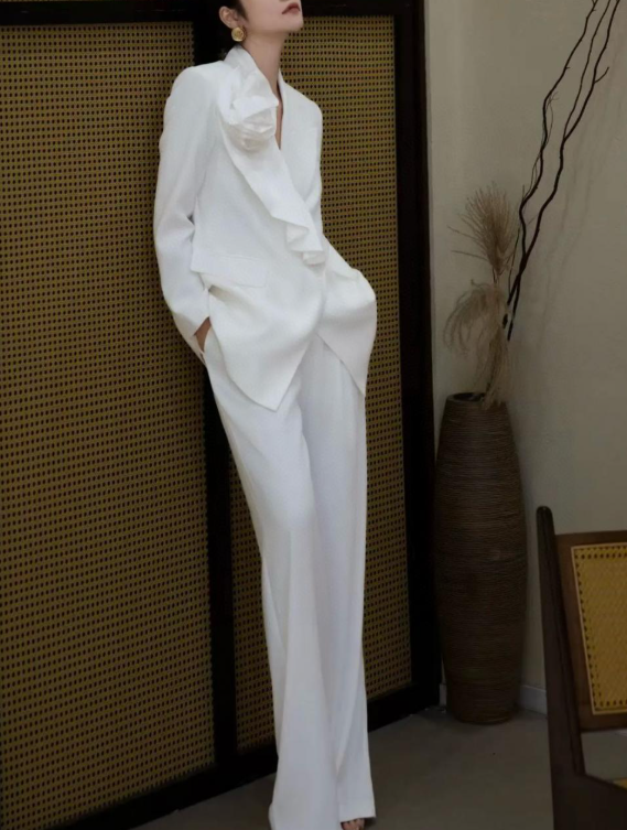 structured suit with oversized floral appliqué – PETAL