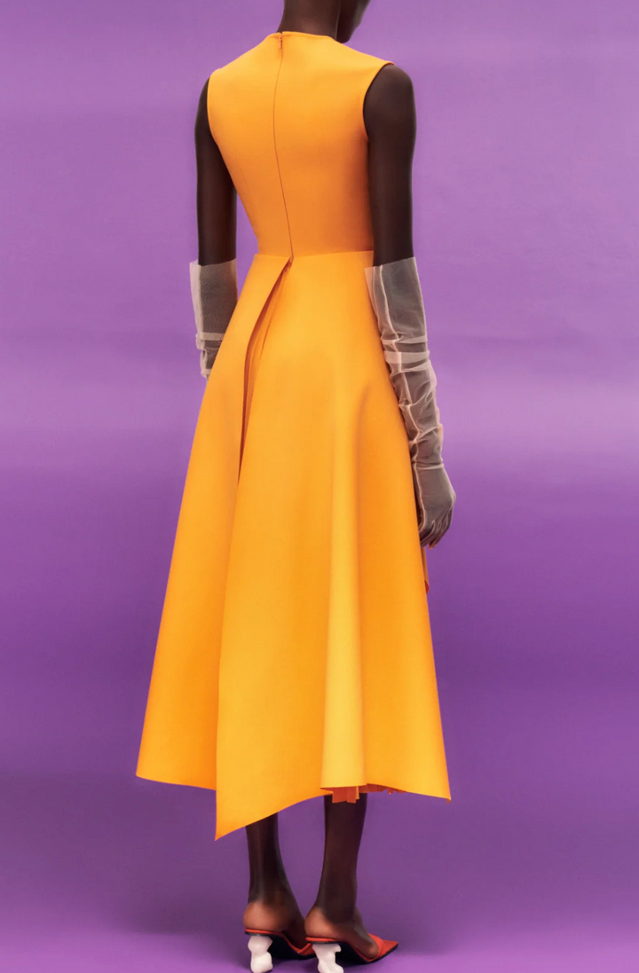 sleeveless peplum dress with layered pleated skirt – MARIGOLD