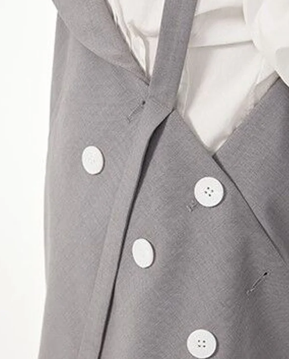 Asymmetric buttoned vest top with layered shirt detail – GREYA