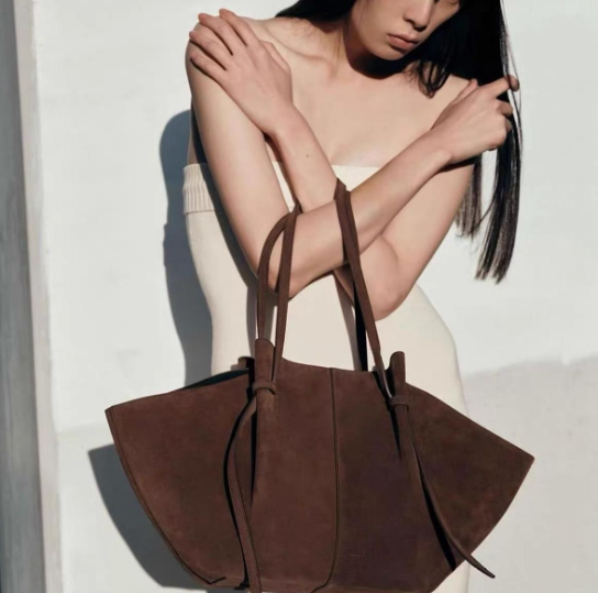 suede winged tote bag with adjustable drawstring straps – SERENA