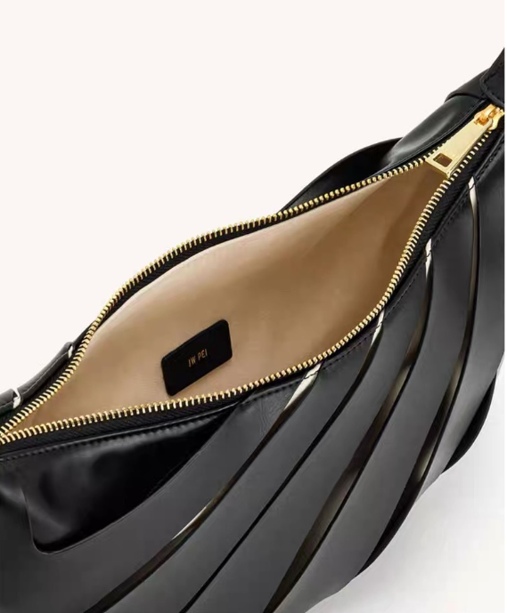 sculptural metallic crescent bag with wrapped handle – SELENE