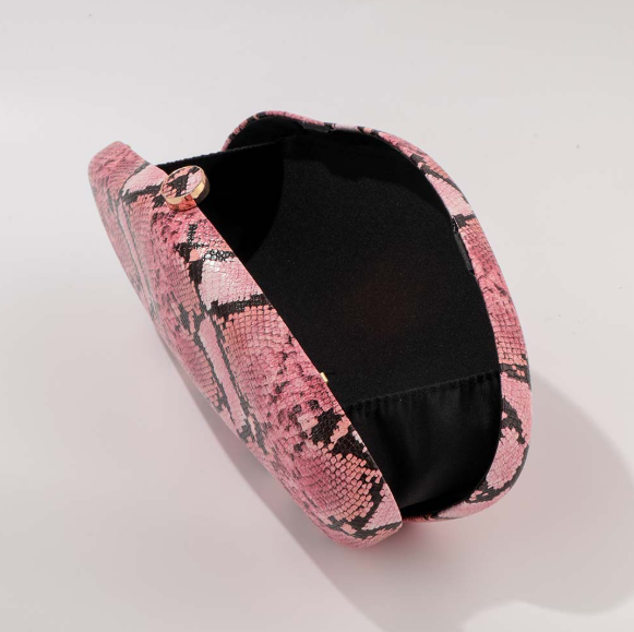 python-effect oval clutch with metallic clasp – VESPER