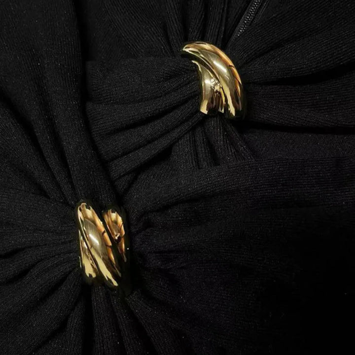 off-shoulder draped top with gold clasp detail – SERAPHINE