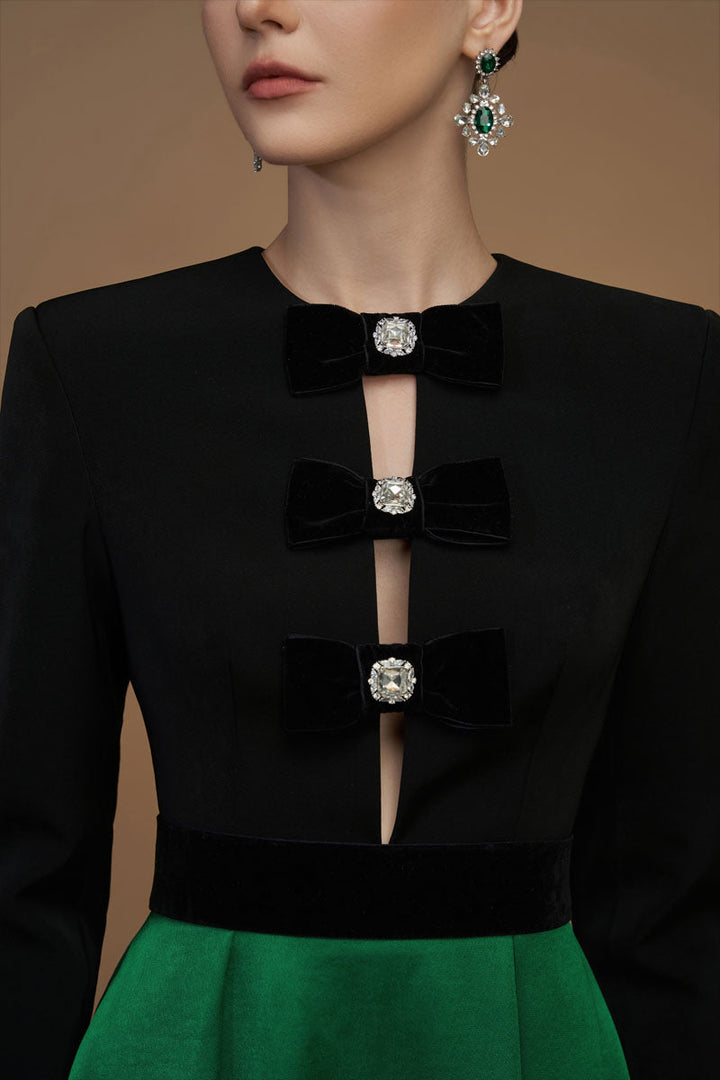 فستان بأكمام طويلة بلونين مع فيونكات مخملية – ريجينا